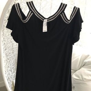 Flowy black dress with cold shoulder and gemstones